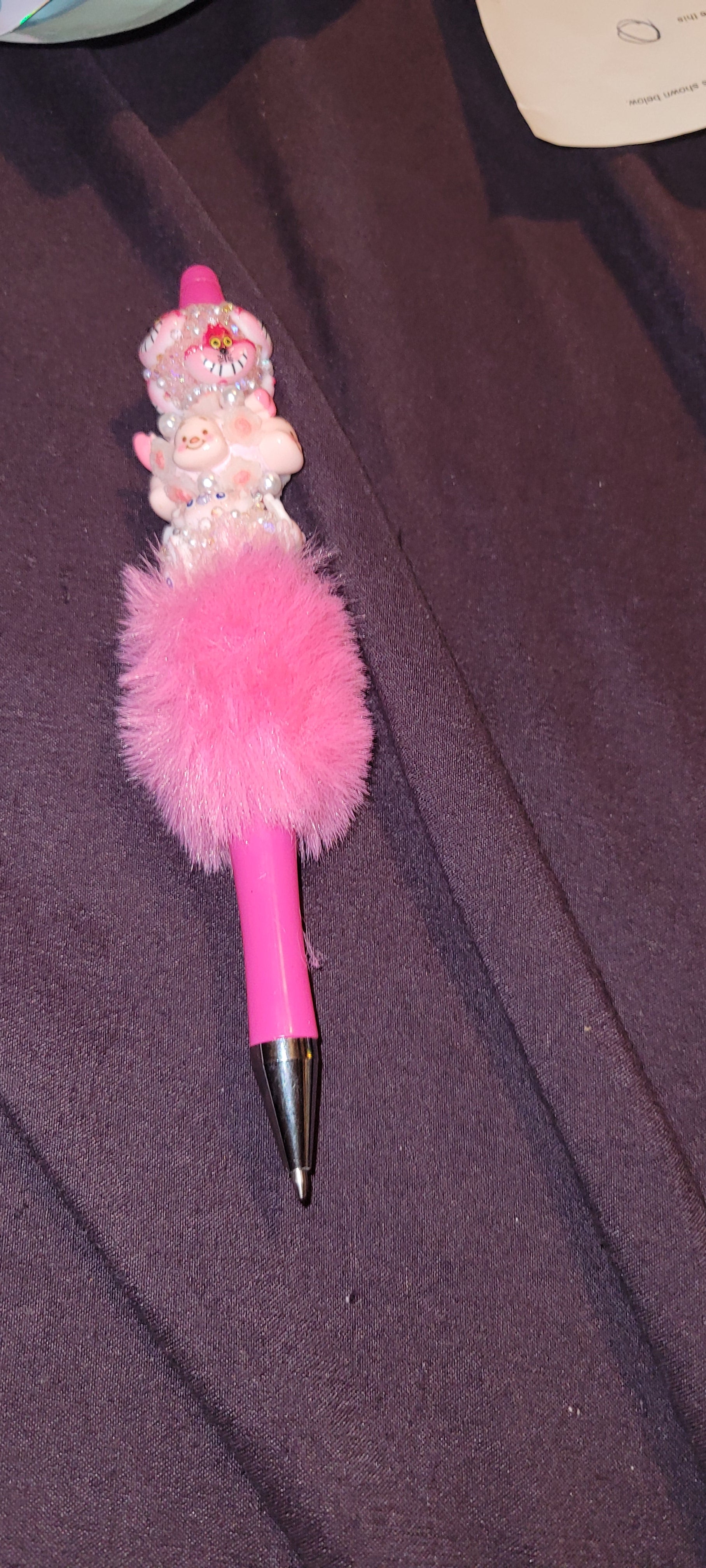 Pink fuzzy pen